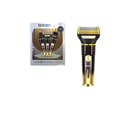 Gold and black electric shaver with packaging on a white background