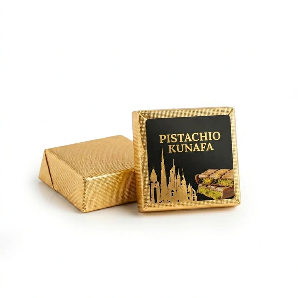 Gold box with 'Pistachio Kunafa' text and image on a white background