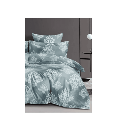Blue floral patterned bedding set on a bed with a dark headboard.