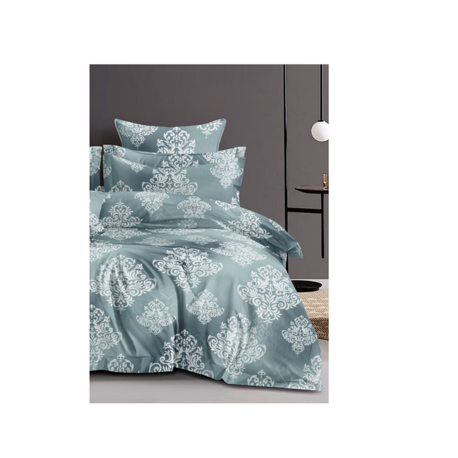 Blue floral patterned bedding set on a bed with a dark headboard.