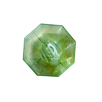 Green plastic hexagonal bowl on a white background