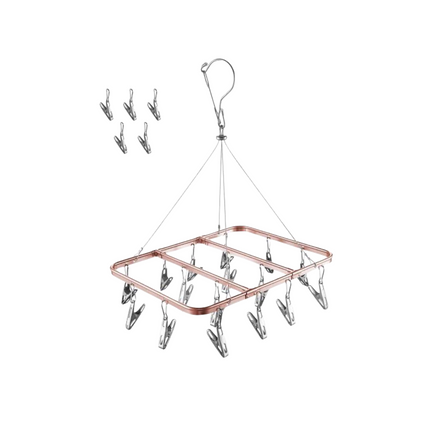 Clothes drying rack with clips on a white background