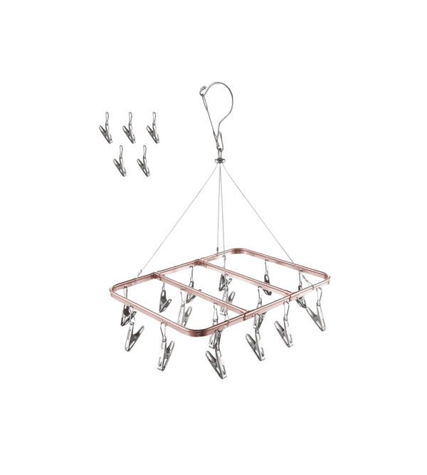 Clothes drying rack with clips on a white background