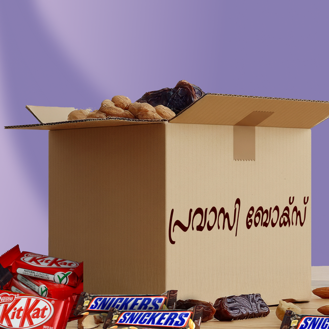 Open cardboard box with snacks and candy bars on a purple background