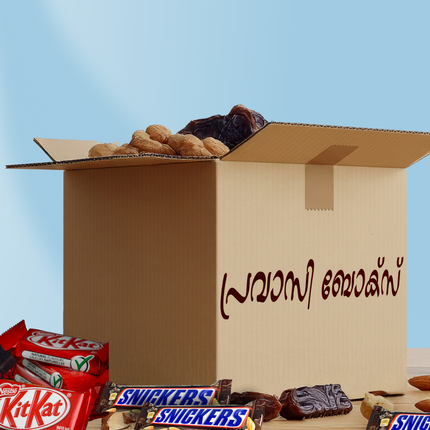 Open cardboard box with snacks and candy bars on a blue background