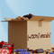 Open cardboard box with snacks and candy bars on a blue background