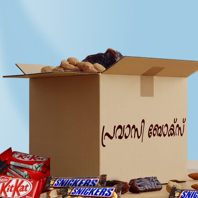 Open cardboard box with snacks and candy bars on a blue background