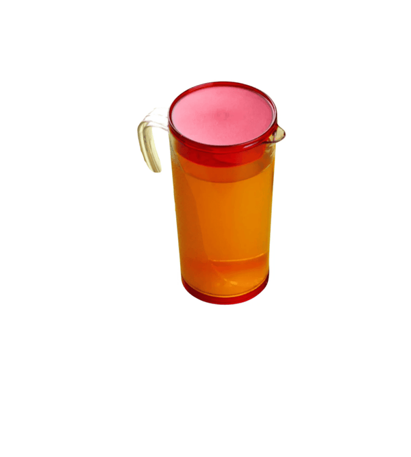Clear plastic pitcher with red interior and handle on a white background