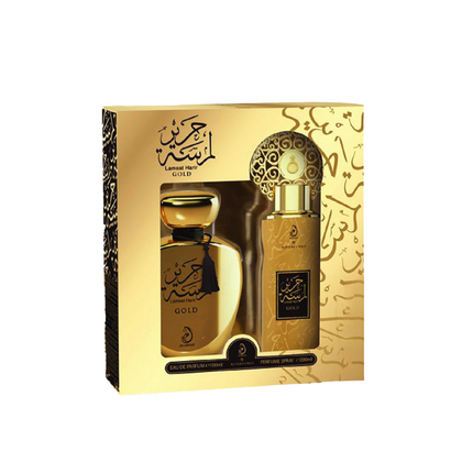 Gold perfume set with packaging on a white background