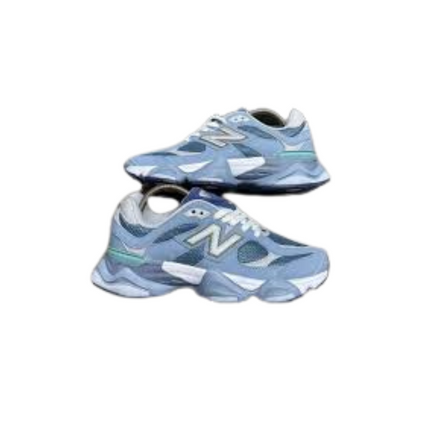 Pair of light blue sneakers with white soles on a white background