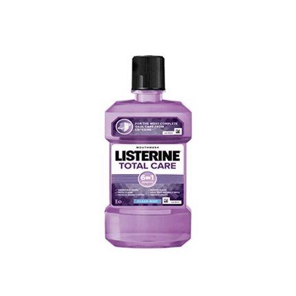 Bottle of Listerine Total Care mouthwash on a white background