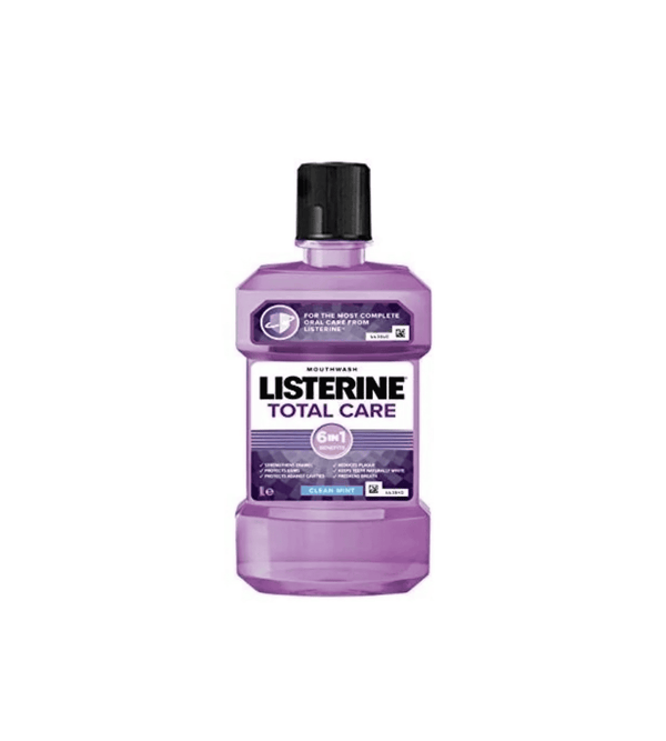Bottle of Listerine Total Care mouthwash on a white background