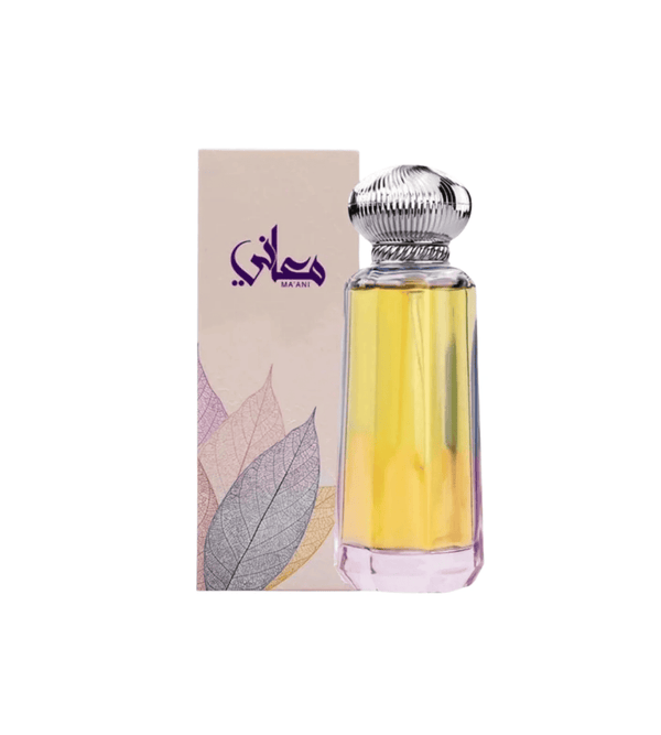 Perfume bottle with a decorative cap and packaging on a white background