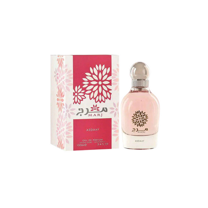 Perfume bottle and packaging with floral design on a white background