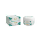 Whitening face cream jar and packaging on a white background