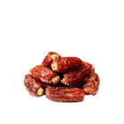 Stack of dried dates on a white background