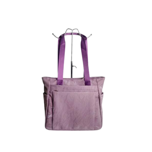 Purple tote bag with straps on a white background