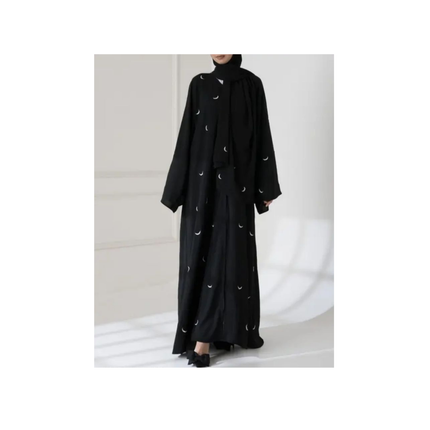 Black abaya with white embroidery on a white background
