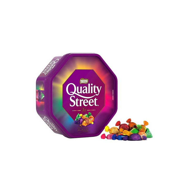 Quality Street chocolate tin with colorful candy pieces on a white background