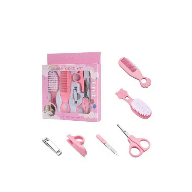 Pink pet grooming kit with tools on a white background