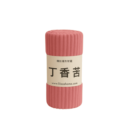 Pink textured roll of fleece blanket with a label on a white background