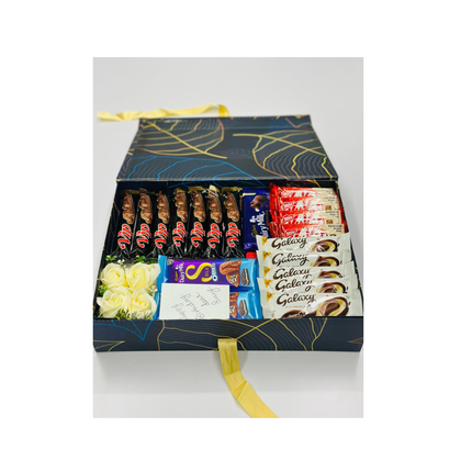 Assorted chocolate bars in a decorative box with a white background