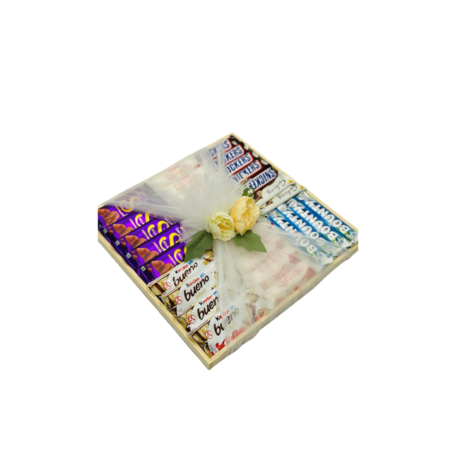 Gift box with Cadbury chocolate bars and a yellow flower on a white background