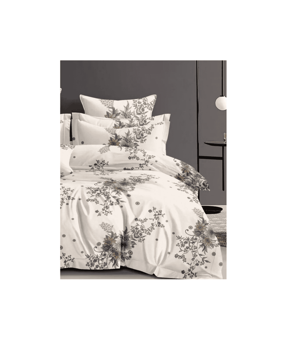 Floral patterned bedding set on a bed with a neutral background