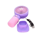 Purple and pink handheld fan with USB cable on a white background