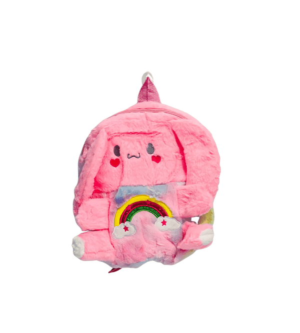 Pink plush backpack with cartoon face and rainbow design on a white background