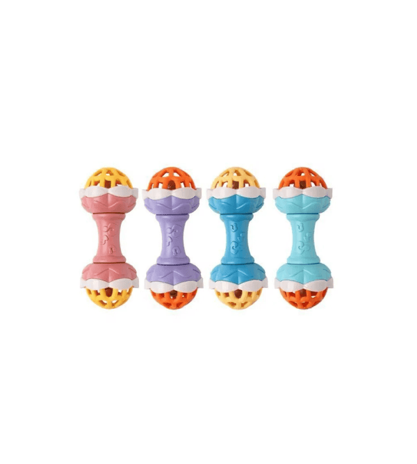 Four colorful baby rattles on a white background