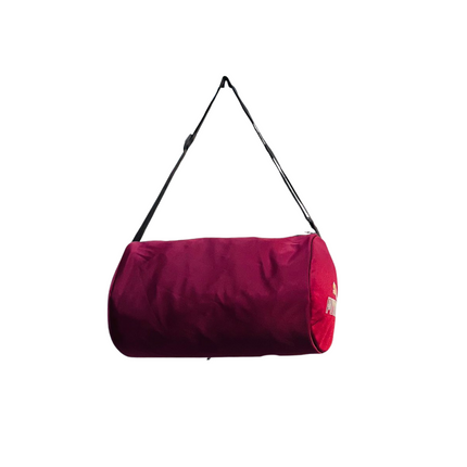 Red duffel bag with a strap on a white background