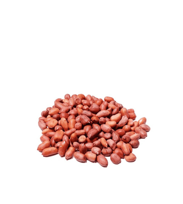 Pile of roasted peanuts on a white background