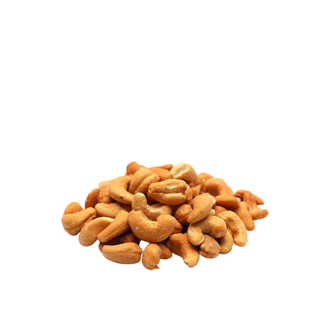Pile of salted cashews  roasted on a white background