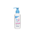 Sebamed massage oil bottle with pump on a white background