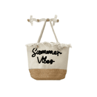 Woven basket with 'Summer Vibes' text and rope handles on a white background