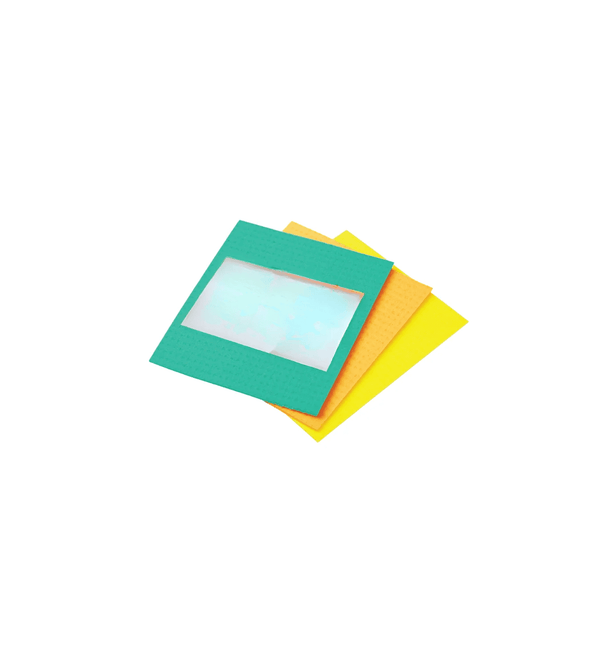 Stack of colorful clean cellulose on a white background