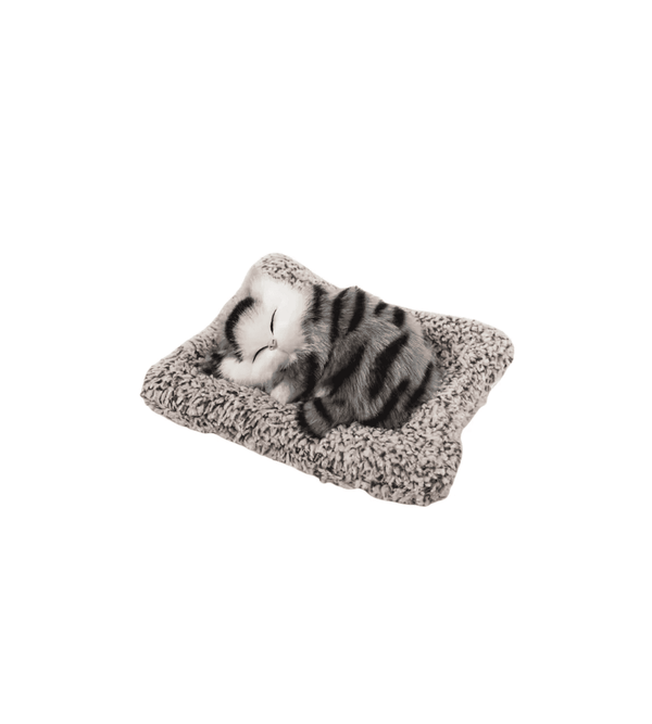 Cat toy shaped like a cat sleeping on a cushion with a white background