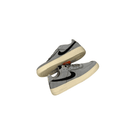 Pair of gray sneakers with a white sole on a white background