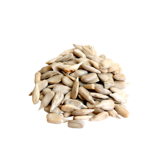 Pile of sunflower seeds on a white background
