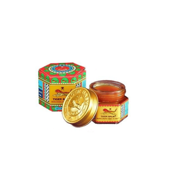 Tiger Balm jar and colorful tin on a white background