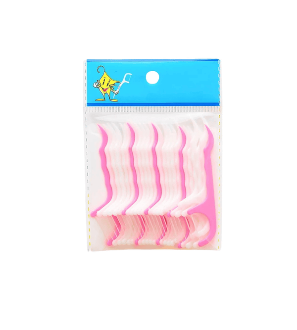 Packaged pink and white fishing lures with a blue label featuring a cartoon fish.