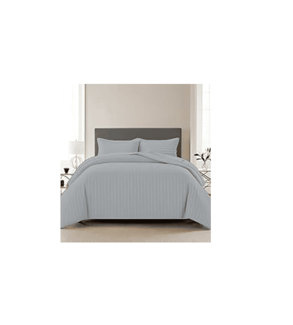 Gray bedsheet  set on a bed in a bedroom setting