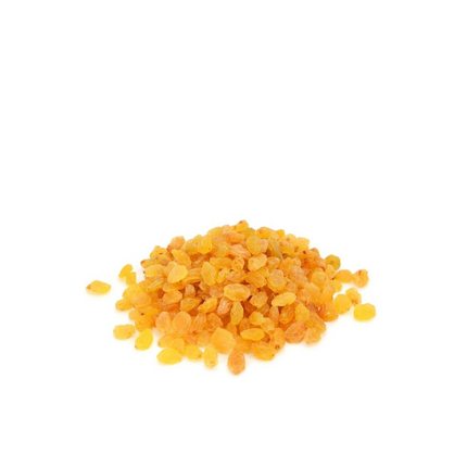 yellow raisins crystals on a white background