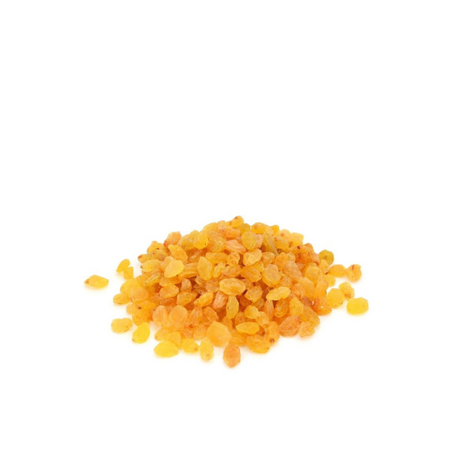 yellow raisins crystals on a white background