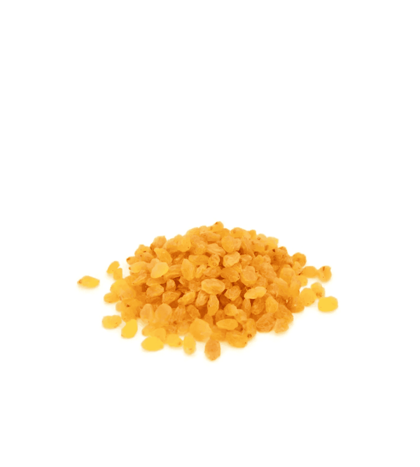 yellow raisins crystals on a white background