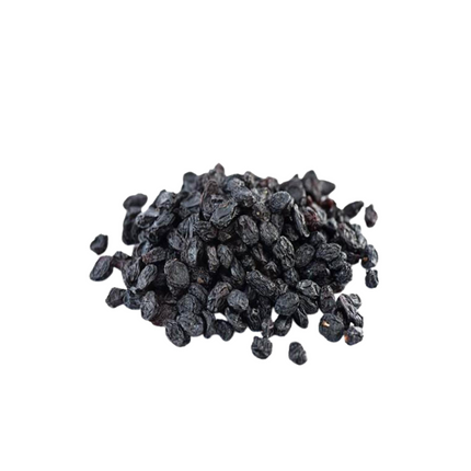 Pile of dark raisins on a white background