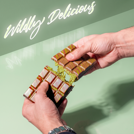 Chocolate bars in a packaging with 'Wildly Delicious' text on a green background